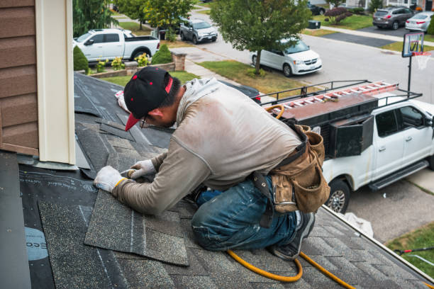 Professional Flat Roof Repair technician working in Melbourne, IA
